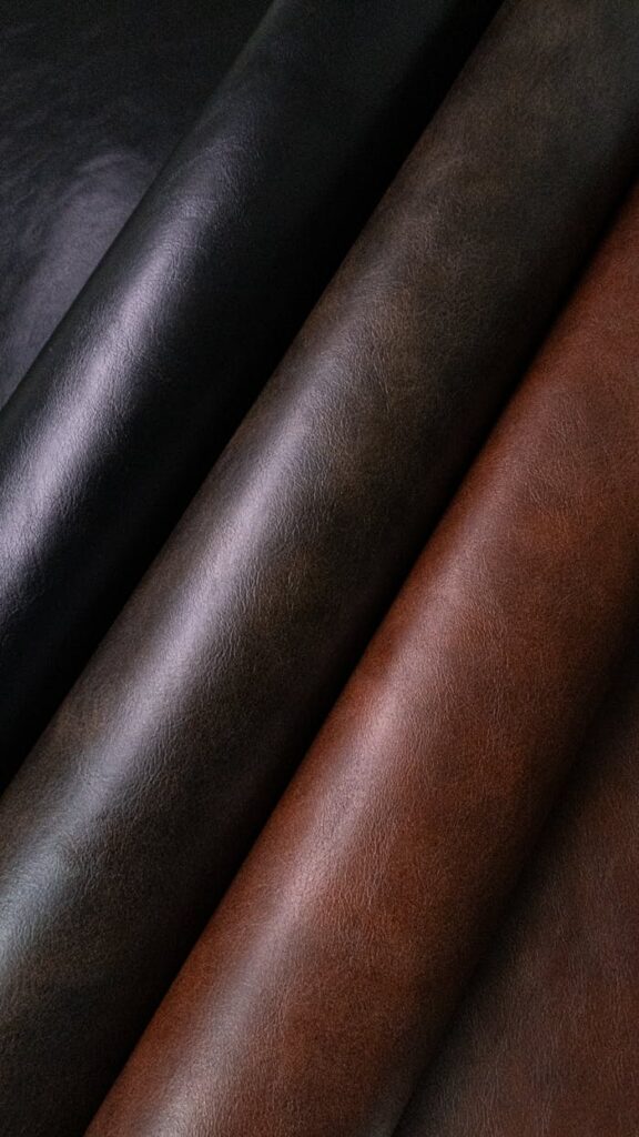 pexels-photo-33436210 High-quality leather rolls showcasing rich textures and shades, captured in León, Guanajuato.